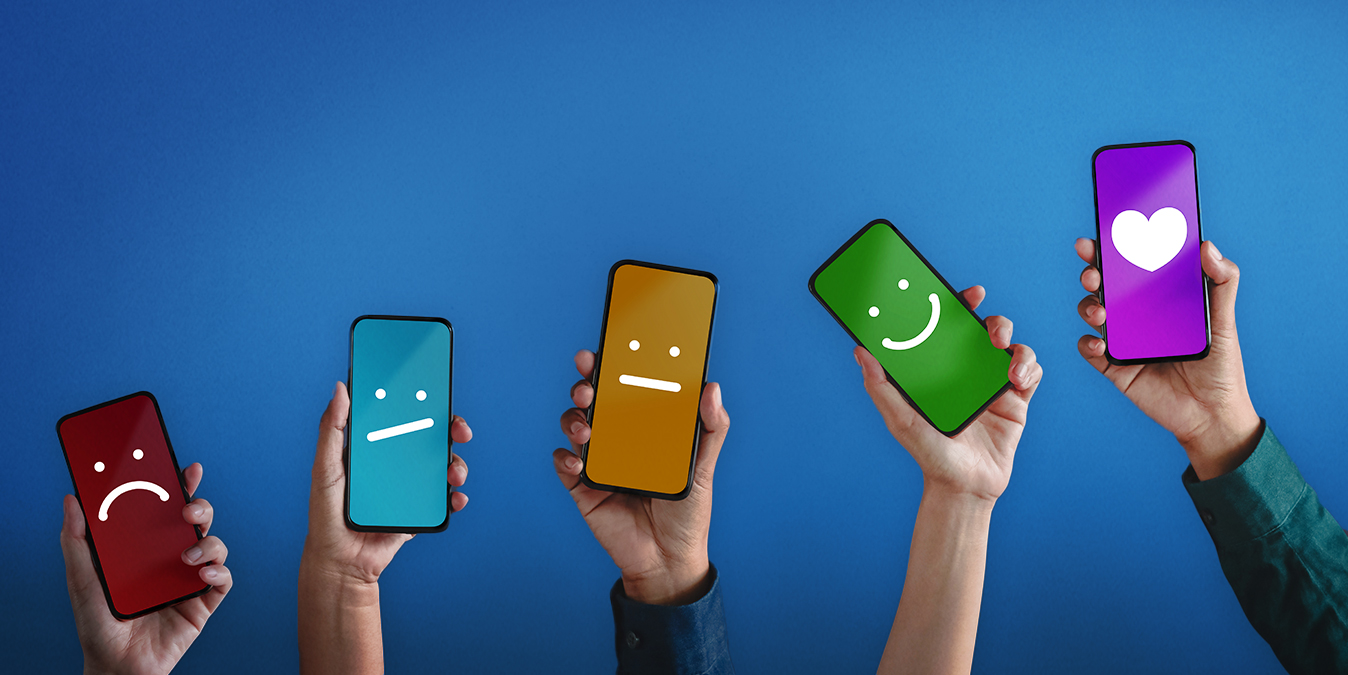 Hands holding phones showing various feedback