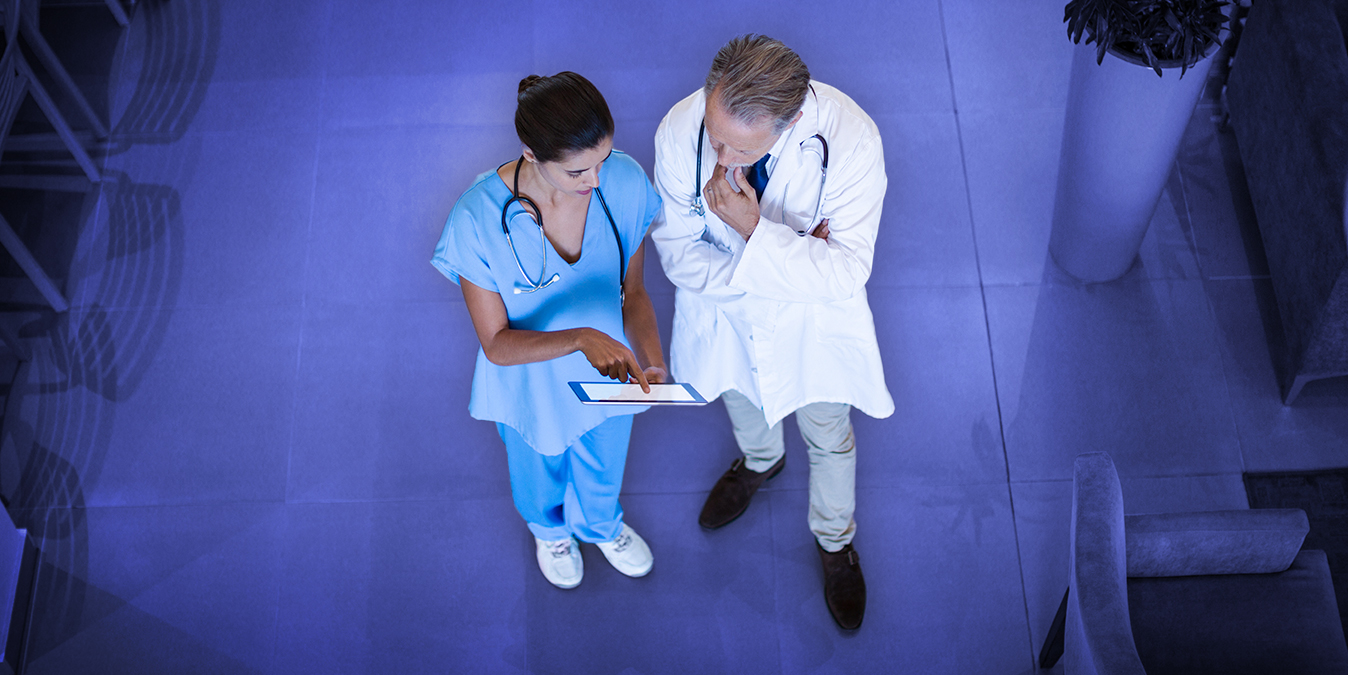 Two medical professionals talking